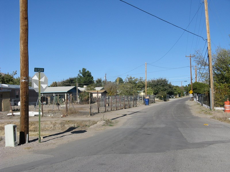 Butterfield Station site at Picacho Village in Dona Ana County, NM A neighborhood street lined with single story ranch homes.