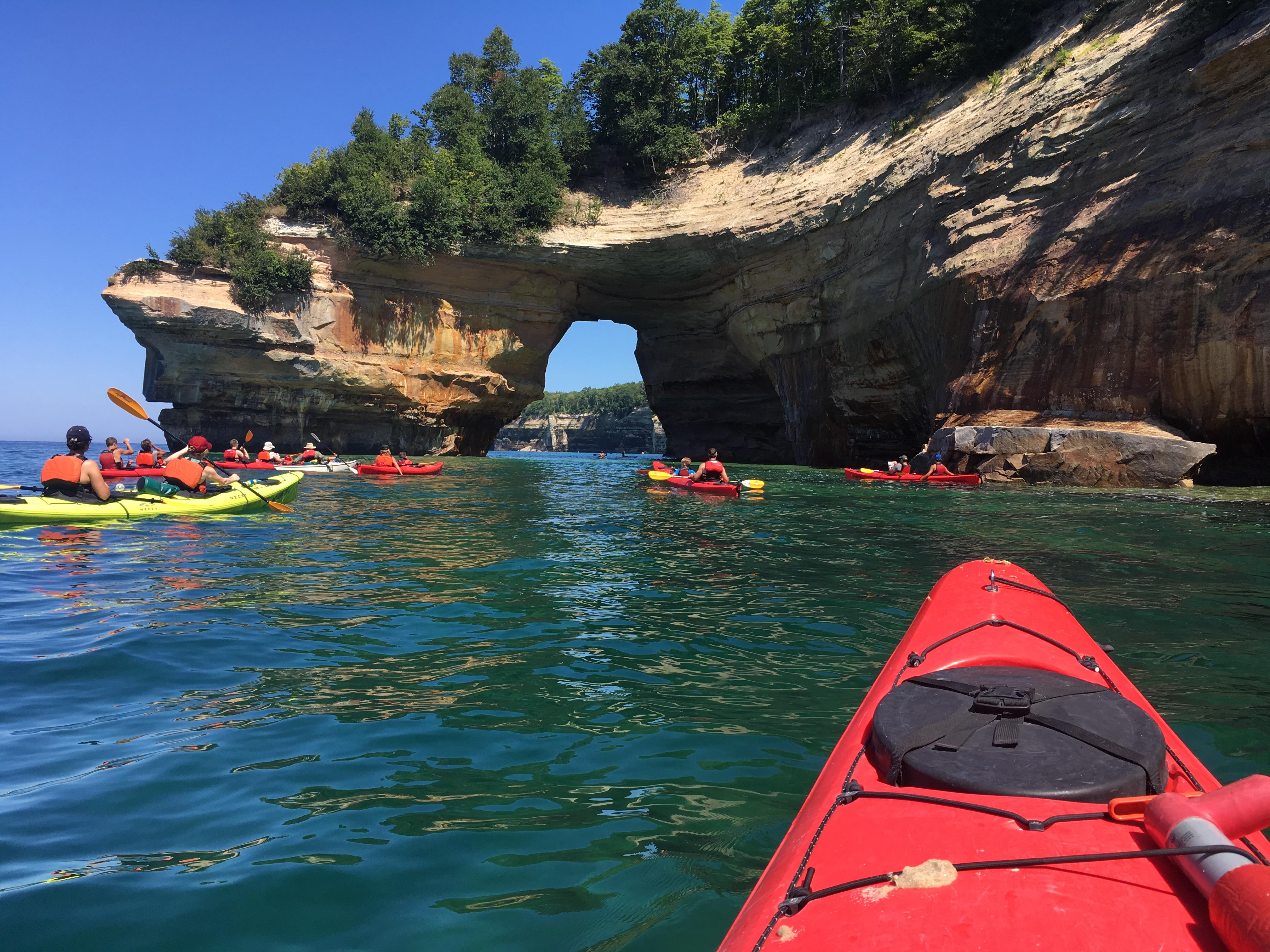 Kayakers near Lovers Leap rock arch formation