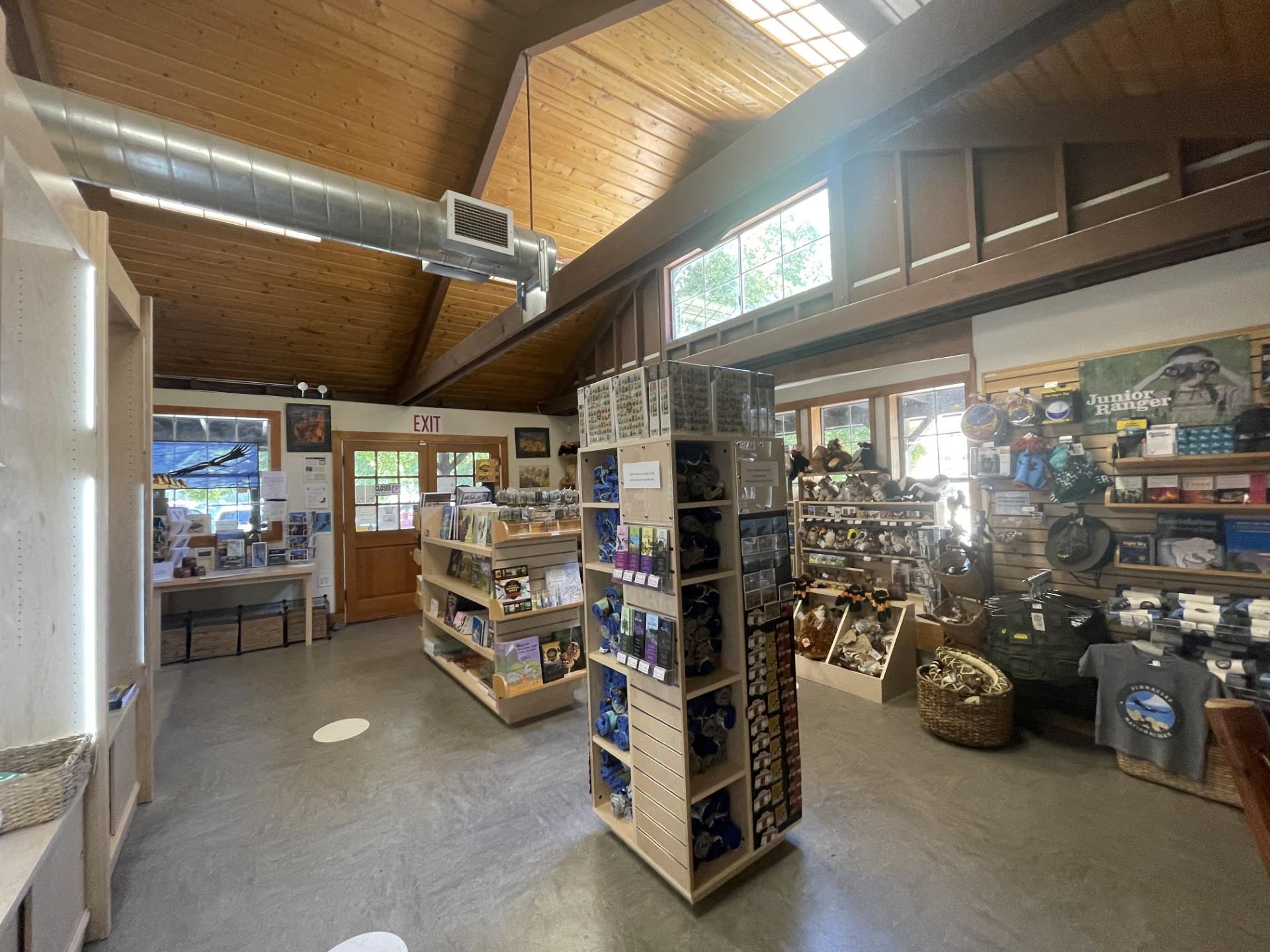 Inside a park store that has magnets, books, games, and plush animals