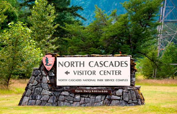 A stone and wood sign for the North Cascades Visitor Center