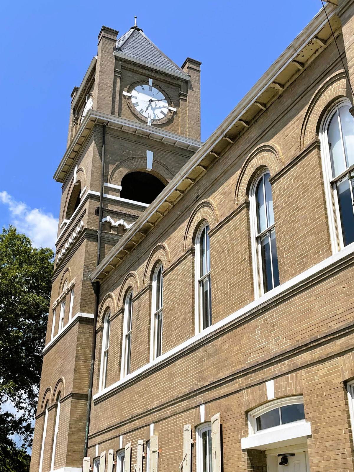 exterior of a building with a clock tower