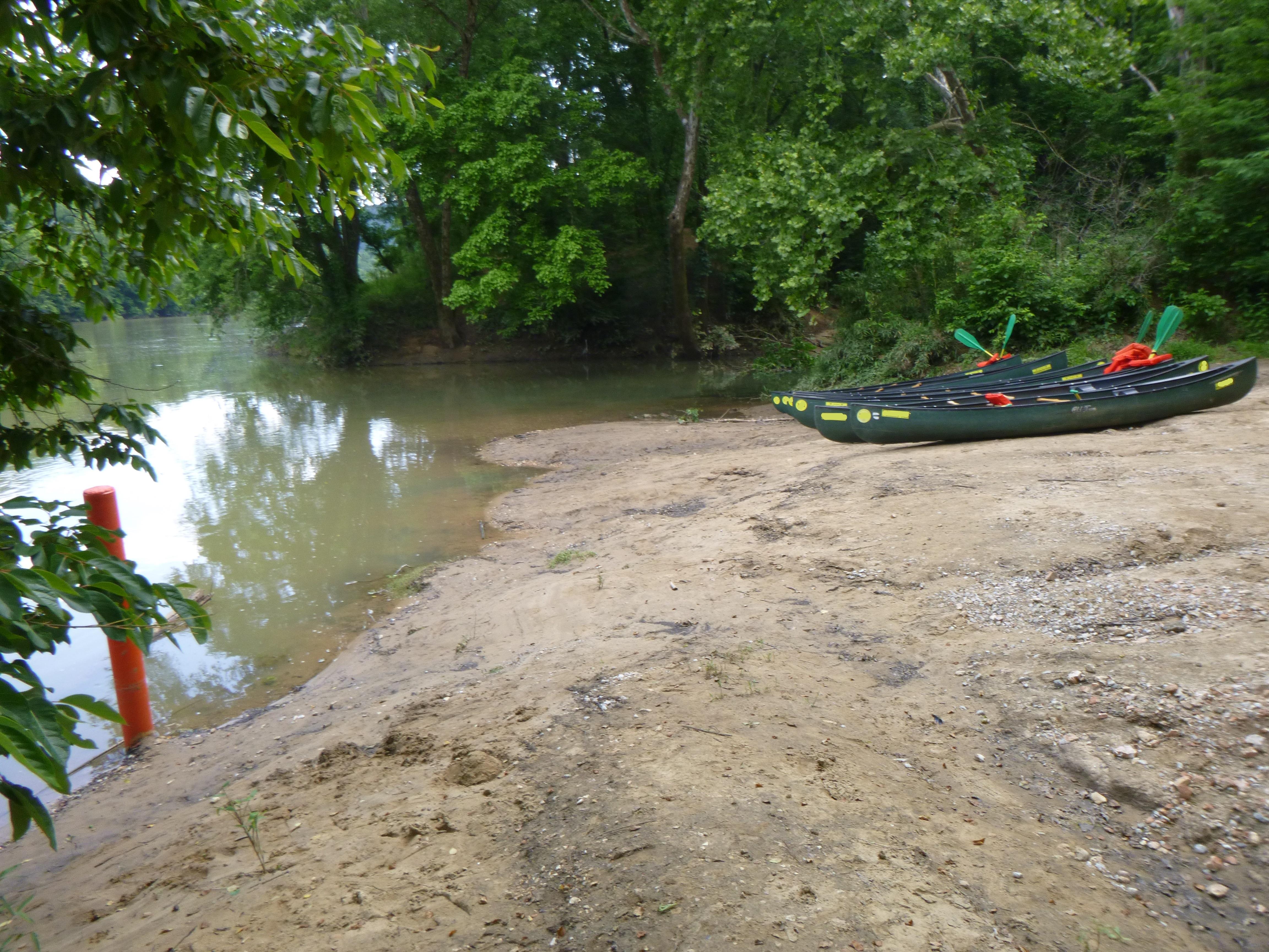 Canoes sit on the gravel bar at Rush.