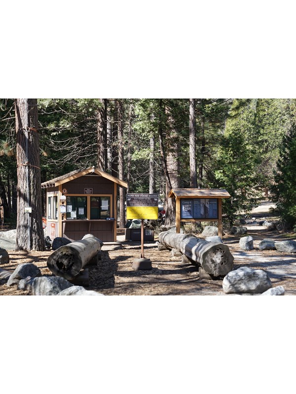 Camp 4 kiosk building and bulletin board