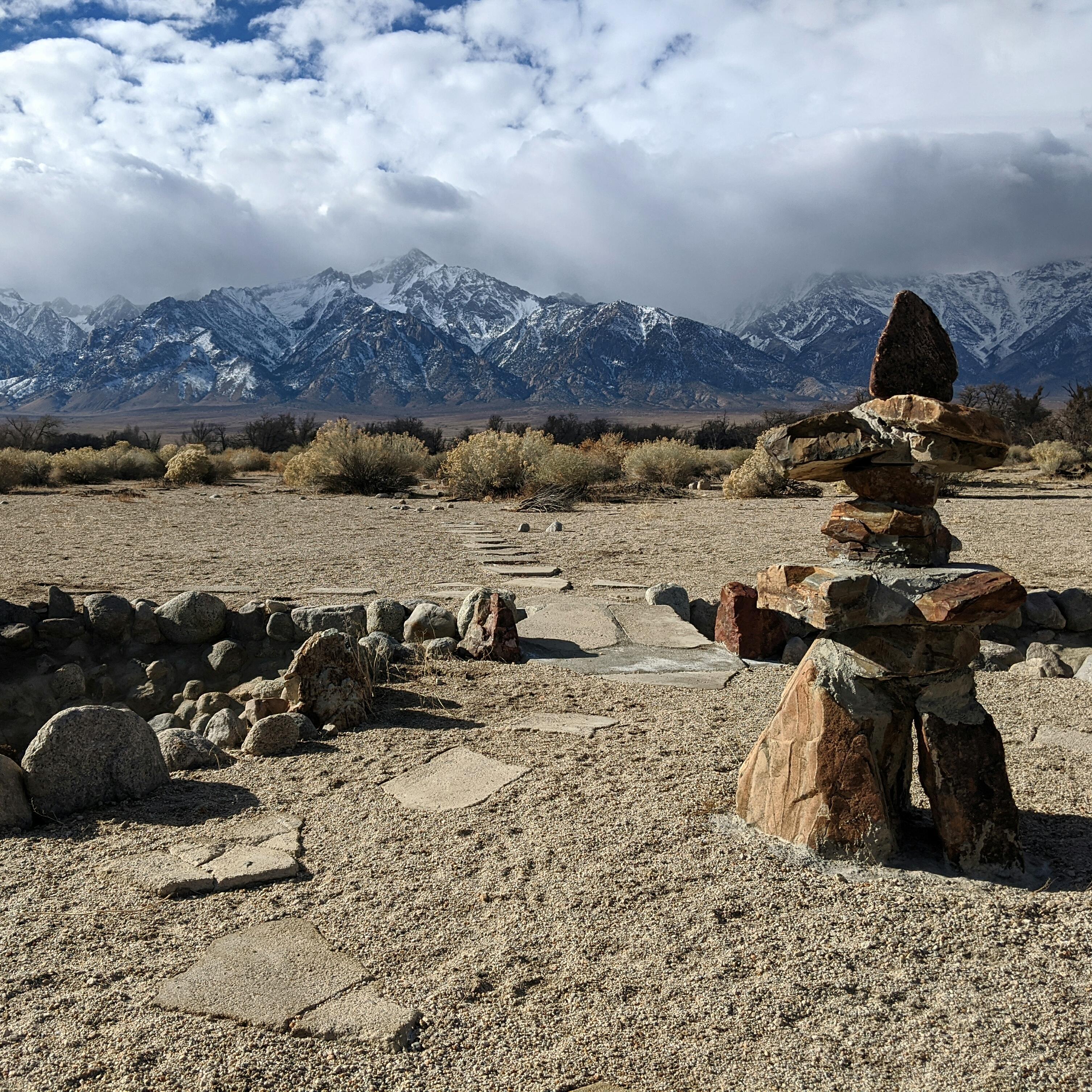 Japanese stone lantern with mountains in background