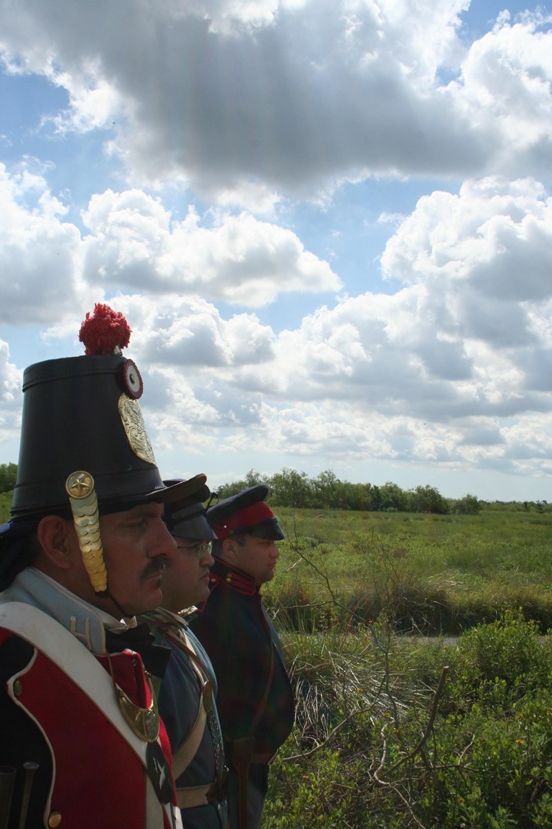 Living History Three living historians in Mexican War era military uniforms