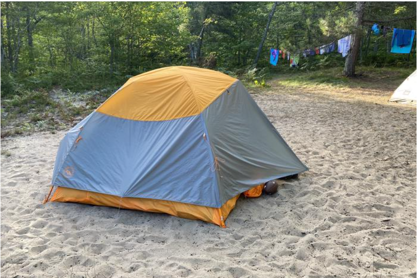 Tent set up on sand.