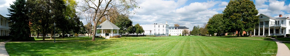Campus with large buildings, trees, and walkways