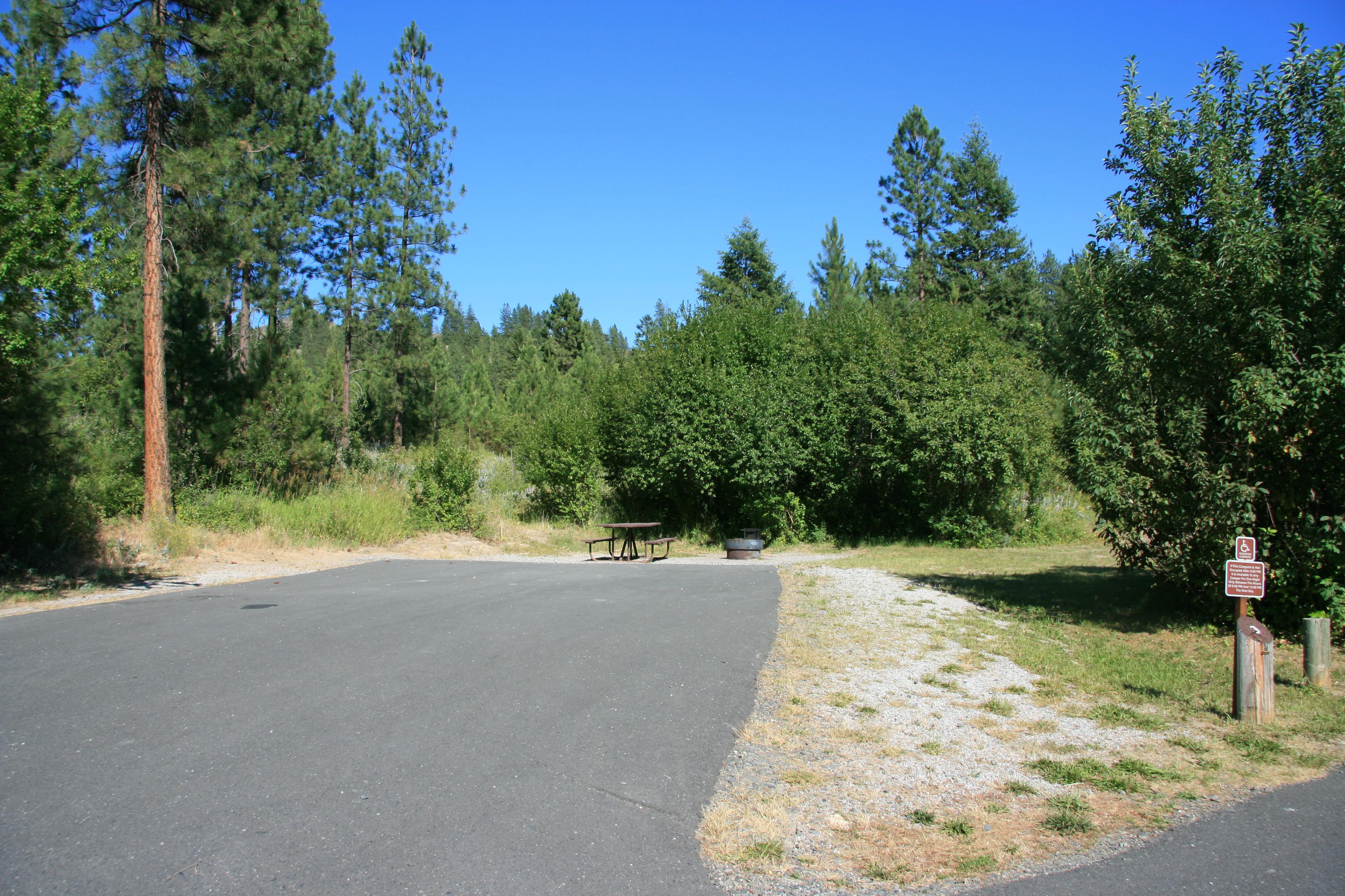 A broadly paved accessible campsite at Hunters Campground.