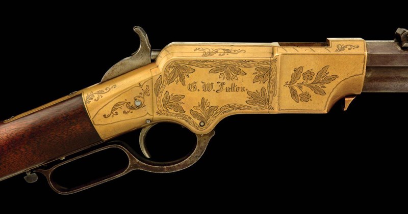 Henry Rifle The receiver of an 1864 rifle shows decorative engraving with the original owner's name