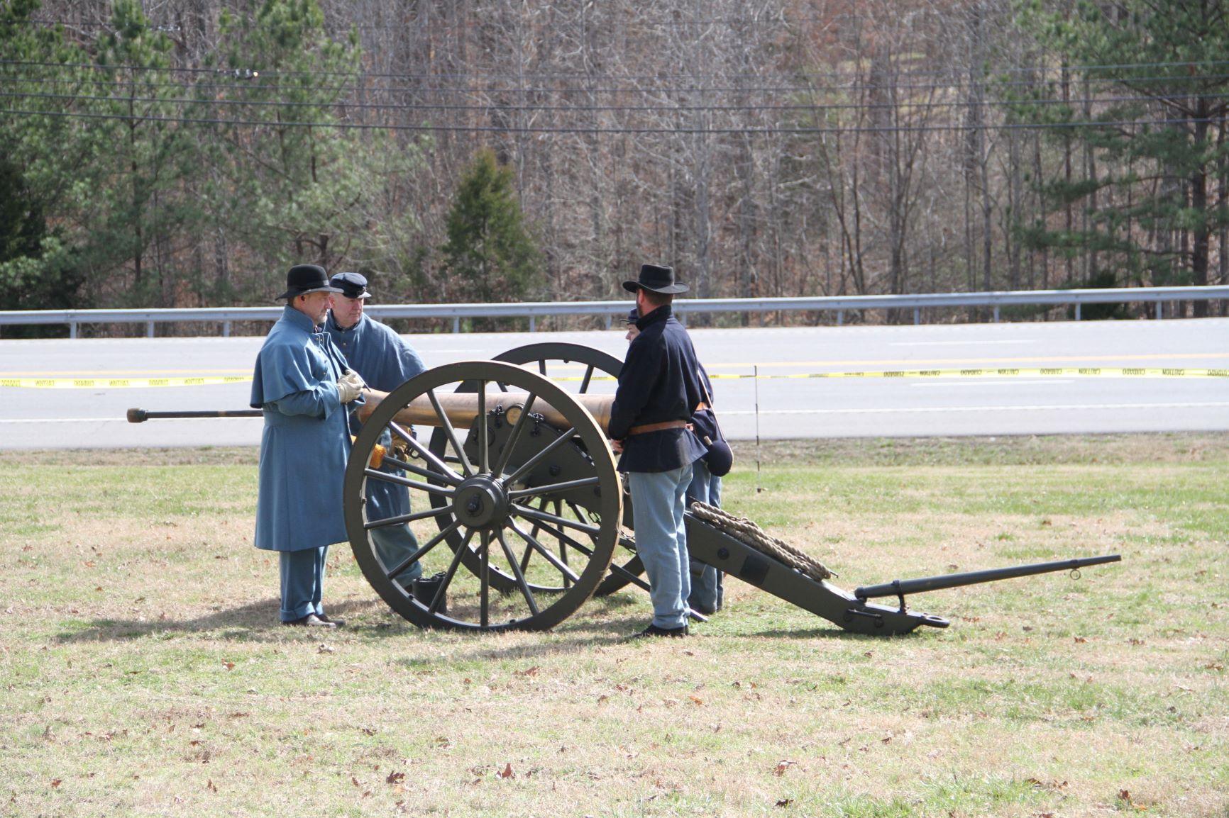 cannon and costumed volunteers