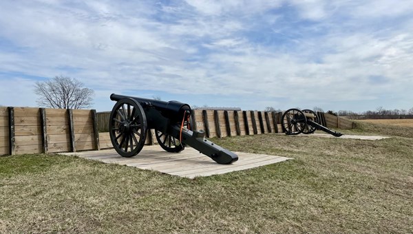 2 cannons at an earthen fort