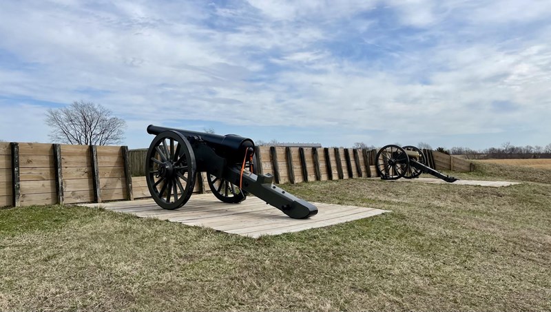 2 cannons at an earthen fort