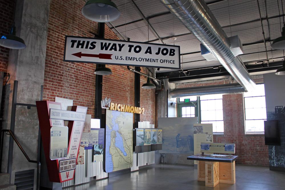 Multiple exhibit signage and panels in the visitor education center.