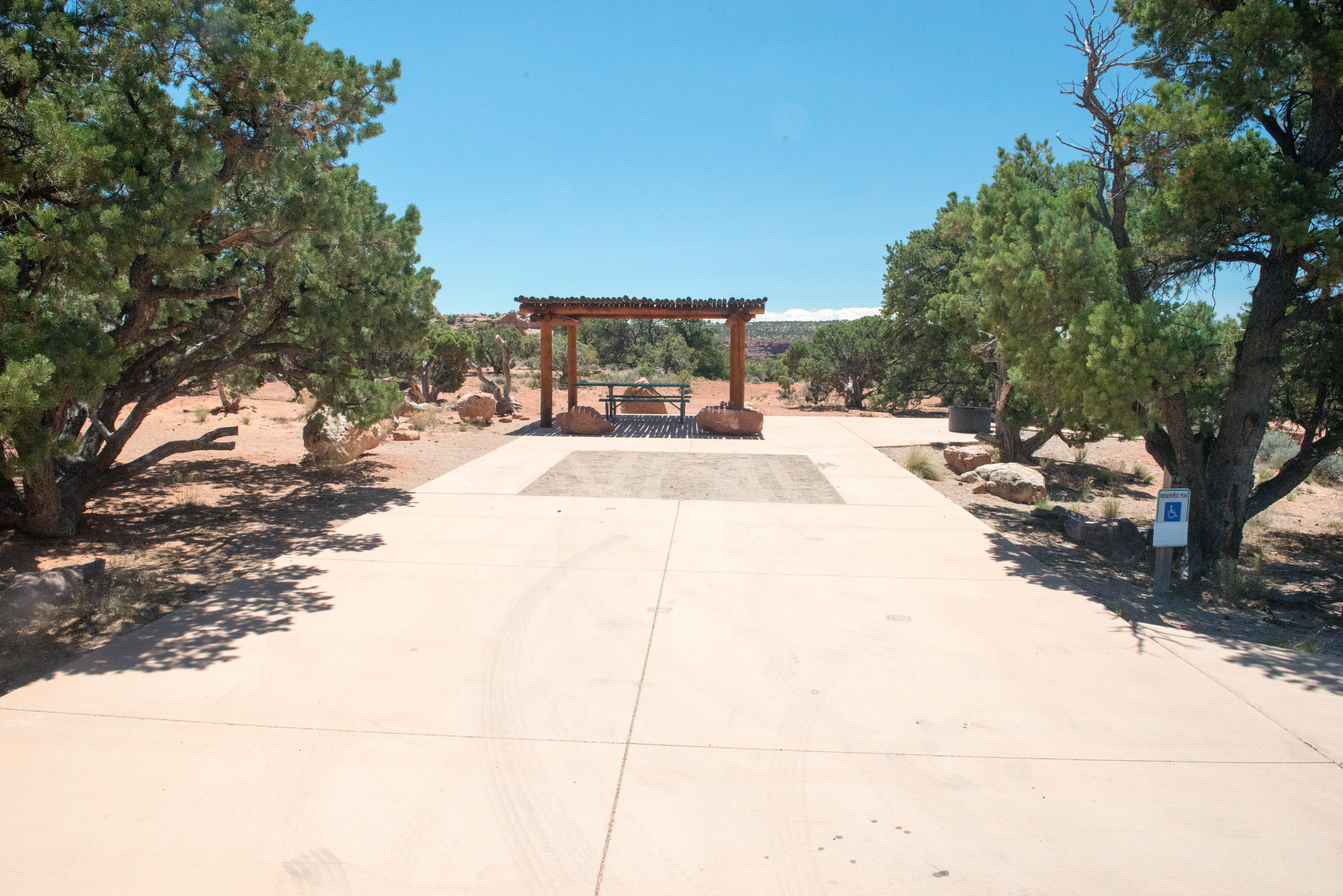 an accessible campsite with paved surfaces surrounding the site