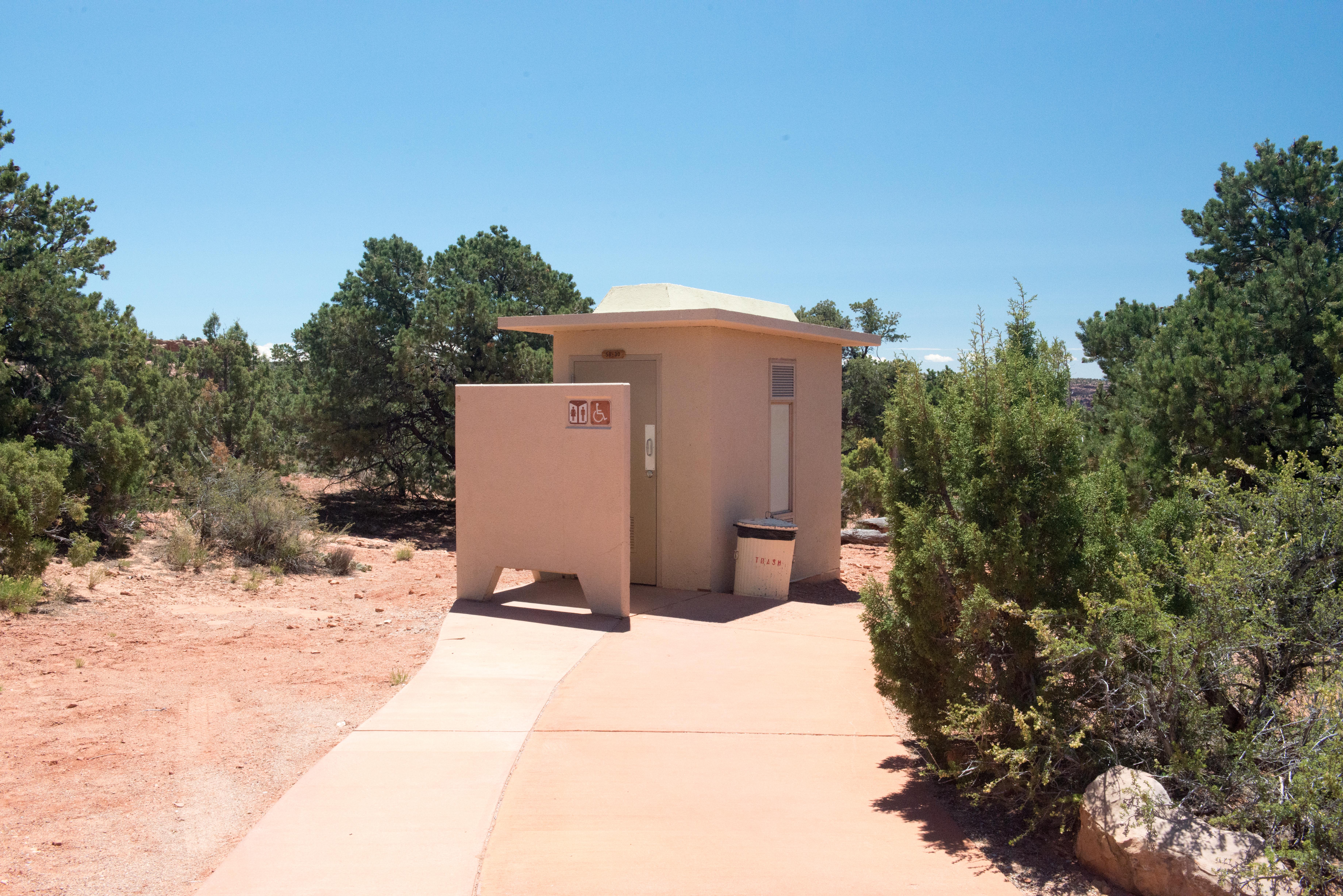 A small, beige building.