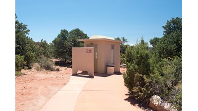 A small, beige building.