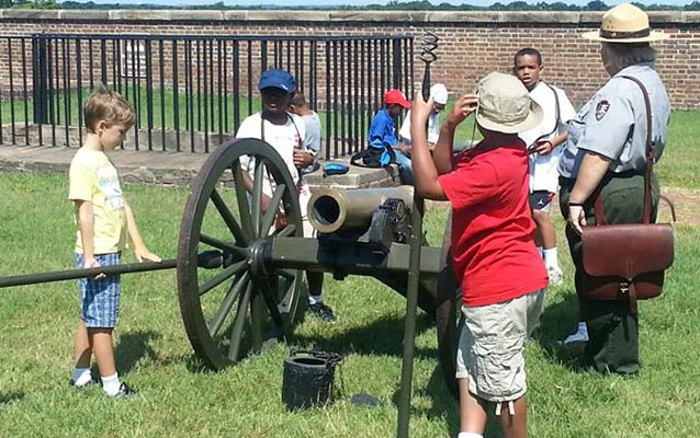 Park Ranger and children with a cannon