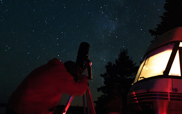 Viewing the Milky Way through a telescope.
