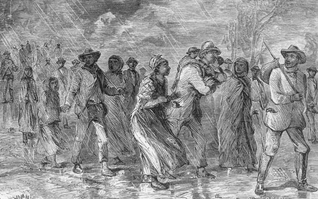 A black and white engraving showing a group of African Americans huddled together. A black and white engraving showing a group of African Americans huddled together.