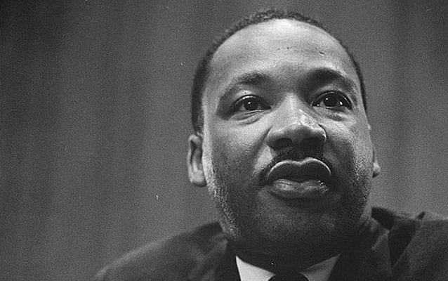 Black and white photo of Dr. Martin Luther King, Jr., an African-American male, showing head and shoulders. Black and white photo of Dr. Martin Luther King, Jr., an African-American male, showing head and shoulders.