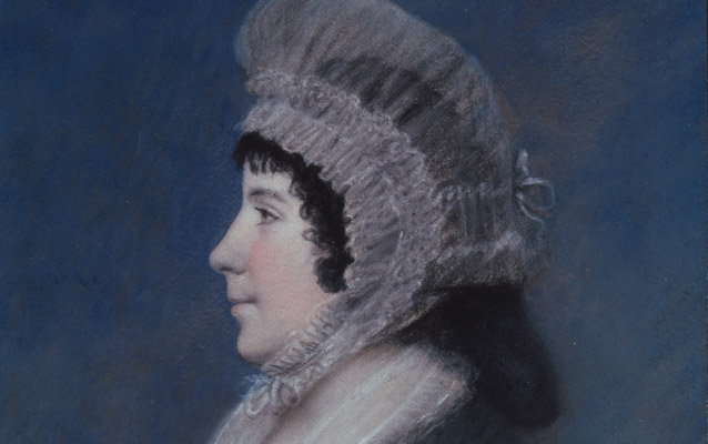 Color pastel of woman in profile, with dark hair and a white nearly transparent bonnet tied under the chin. Color pastel of woman in profile, with dark hair and a white nearly transparent bonnet tied under the chin.
