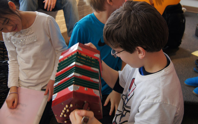 Playing an portuguese concertina