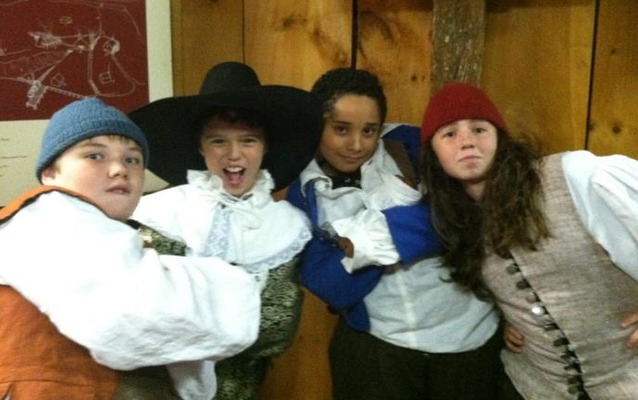 Students participate in a role-play.