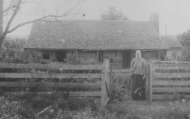 Nancy Morton Staples in front of the Morton Home, c. 1913.