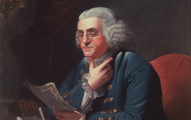 Portrait of Benjamin Franklin holding papers in one hand.