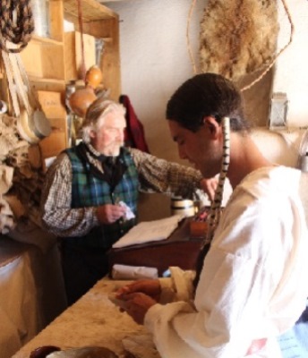 Indian Man and Trader in Trade Room