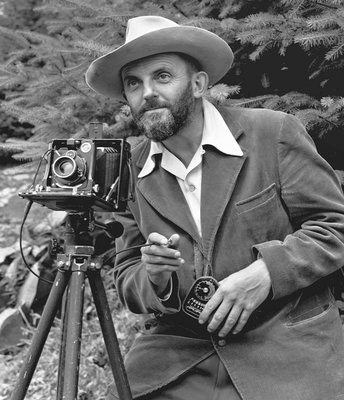 Ansel Adams, who photographed many national parks, operating a camera Ansel Adams, who photographed many national parks, operating a camera