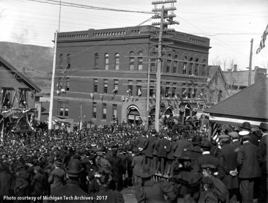 A Spanish-American War militia leaves downtown Houghton