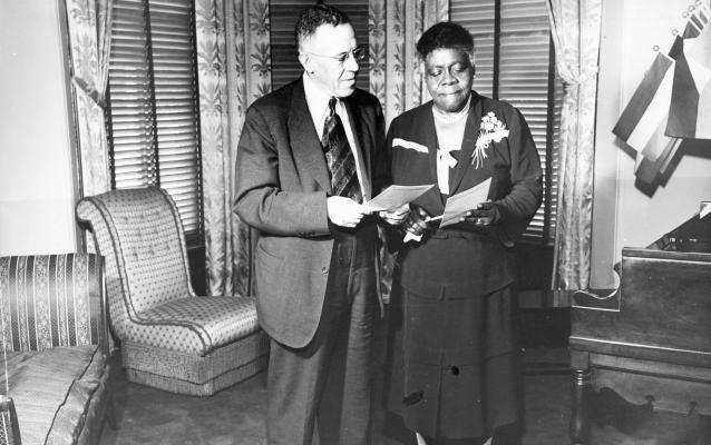 Mrs. Bethune with Cumberland Posey in the Parlor at NCNW's headquarters (Council House) Mrs. Bethune with Cumberland Posey in the Parlor at NCNW's headquarters (Council House)