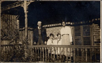 The Pope family outside their home