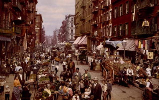 Busy street scene in an ethnic neighborhood in New York City, circa 1900; photochrom format. Busy street scene in an ethnic neighborhood in New York City, circa 1900; photochrom format.