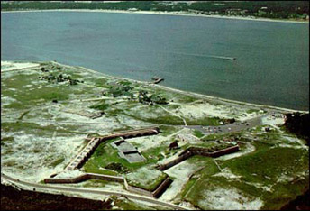 The outline of a historic stone fort on a sandy coast The outline of a historic stone fort on a sandy coast