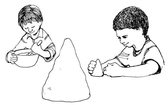 Two boys prepare the “Tasty Trees” of this activity Two boys prepare the “Tasty Trees” of this activity