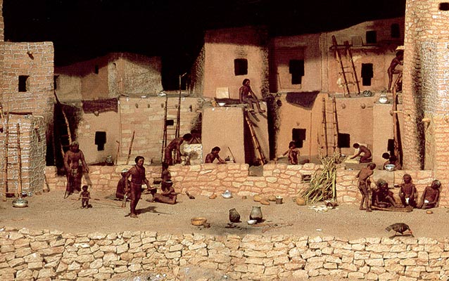 Diorama of Spruce Tree House with Ancestral Pueblo people going about their daily activities Diorama of Spruce Tree House with Ancestral Pueblo people going about their daily activities