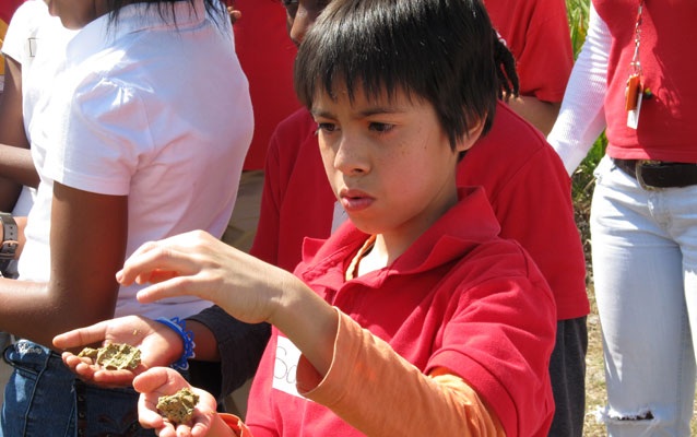 Student holding Periphyton Algea Student holding Periphyton Algea