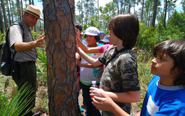 Ranger Greg with students in the Pine Rockland Habitat Ranger Greg with students in the Pine Rockland Habitat