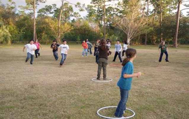 Students hula-hooping Students hula-hooping