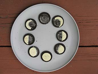 Oreo Cookies arranged in a circle as eight phases of the moon Oreo Cookies arranged in a circle as eight phases of the moon