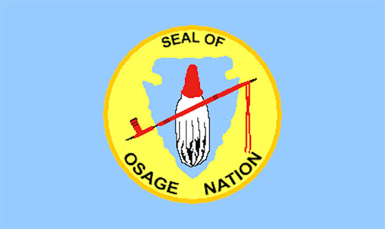 yellow ciircle with spear and words Seal of Osage Nation yellow ciircle with spear and words Seal of Osage Nation