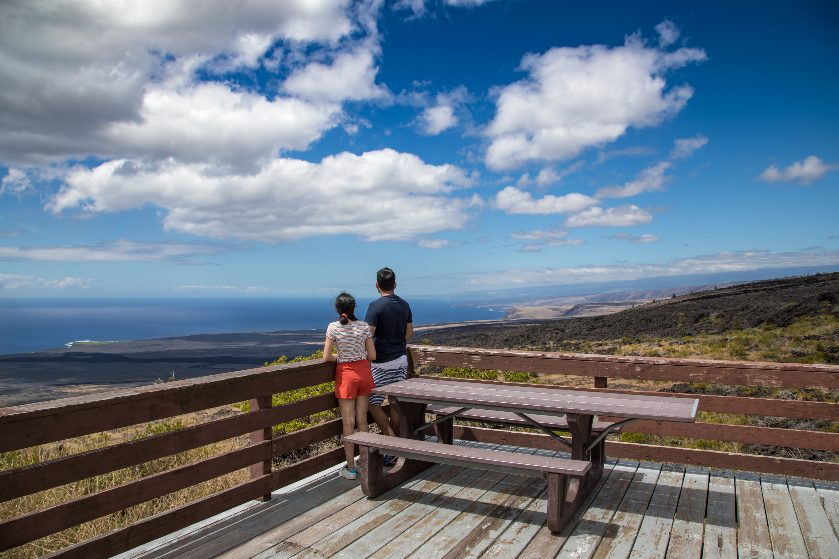 Park visitors on the observation deck at Kealakomo Overlook