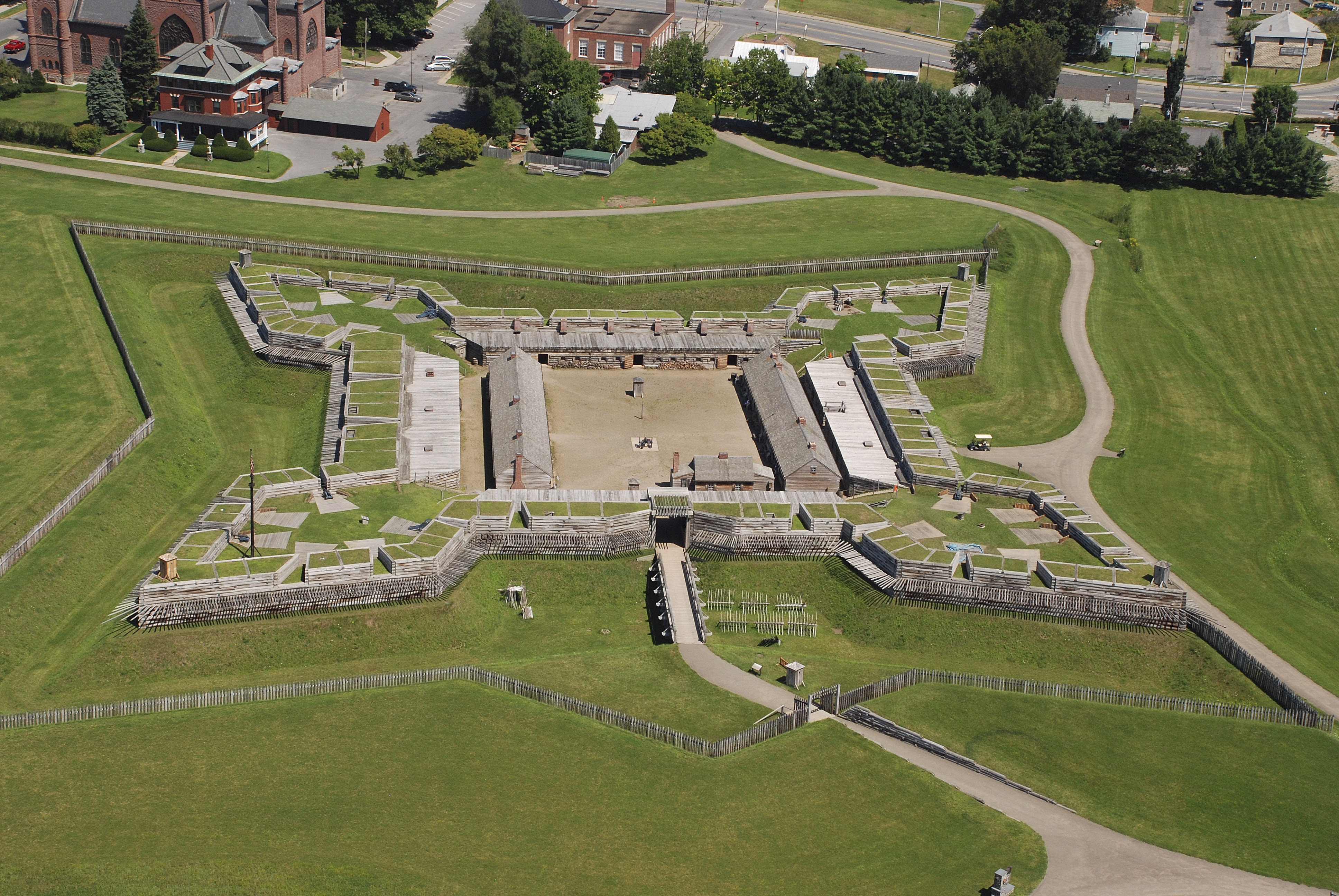 From above a 4-pointed star-shaped wooden fort.