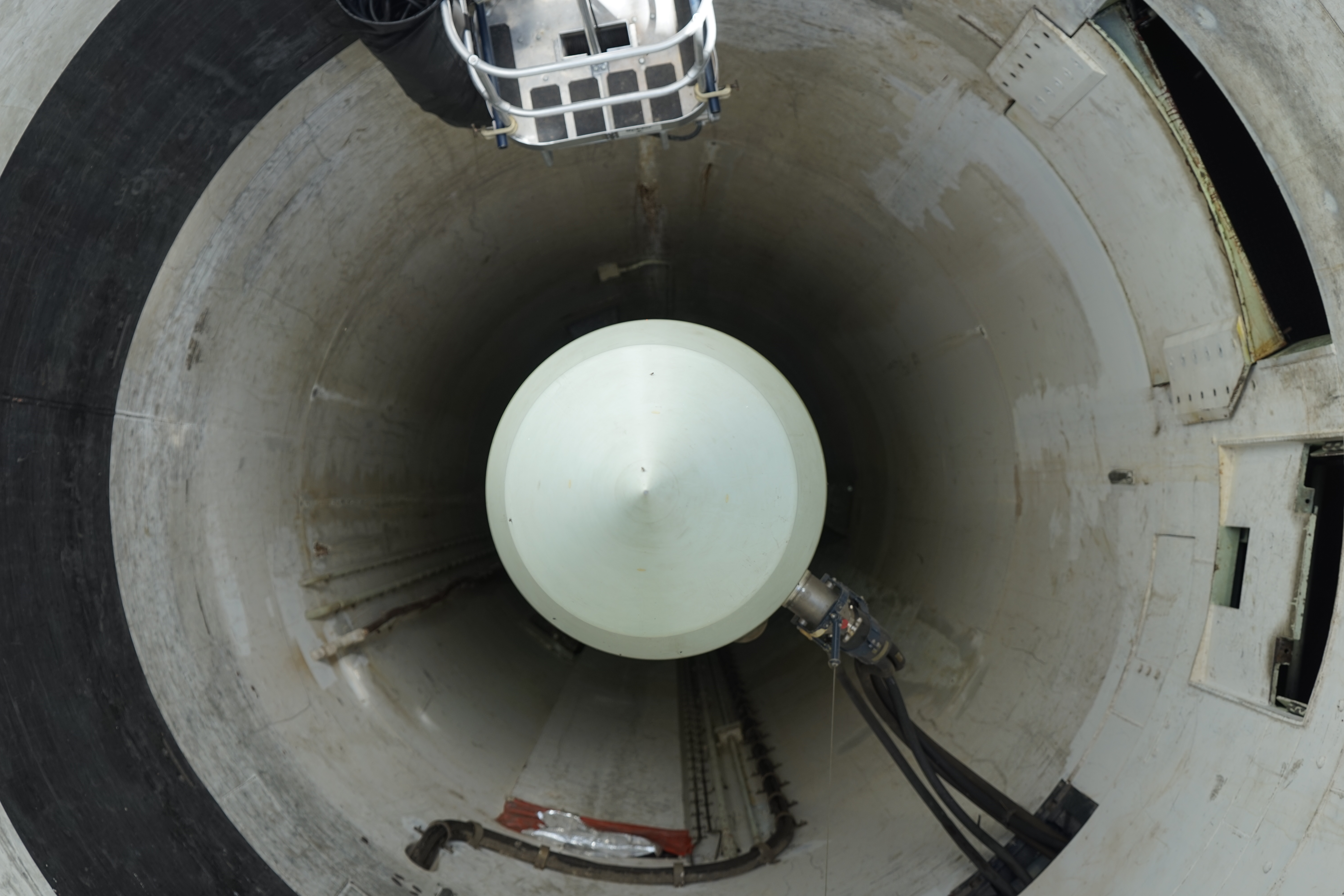 A missile viewed straight down in the launch tube