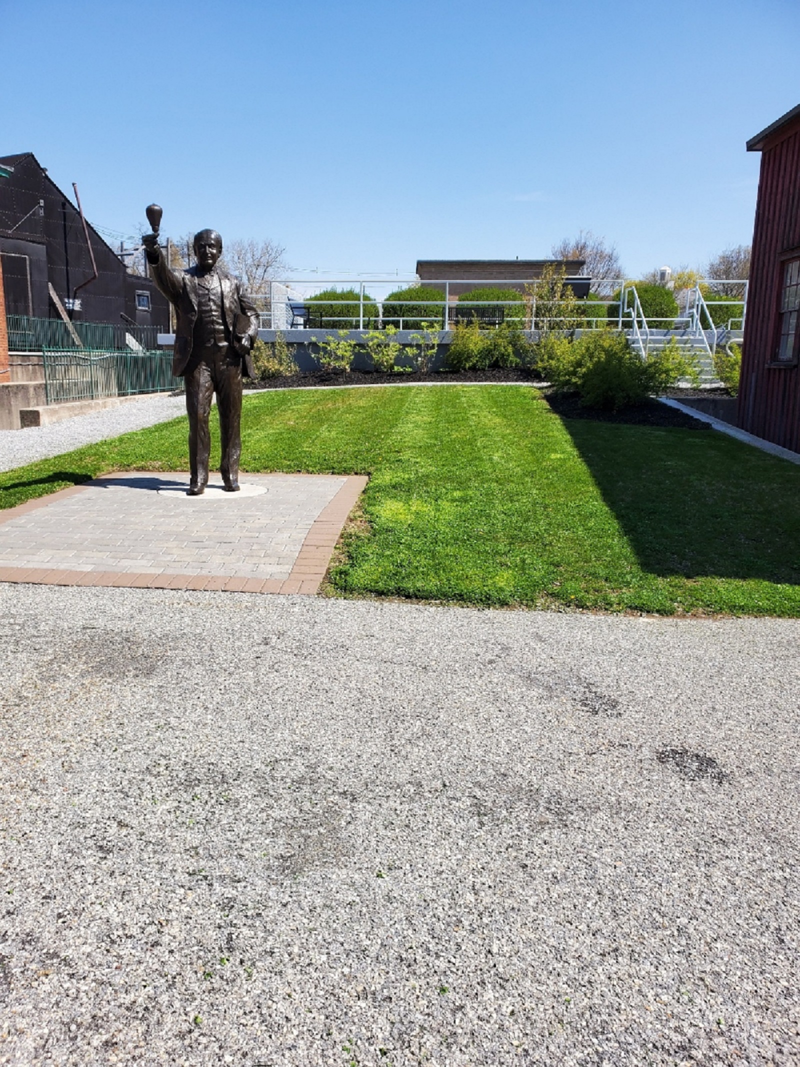 Looking at part of the courtyard which contains a statue of Thomas Edison.