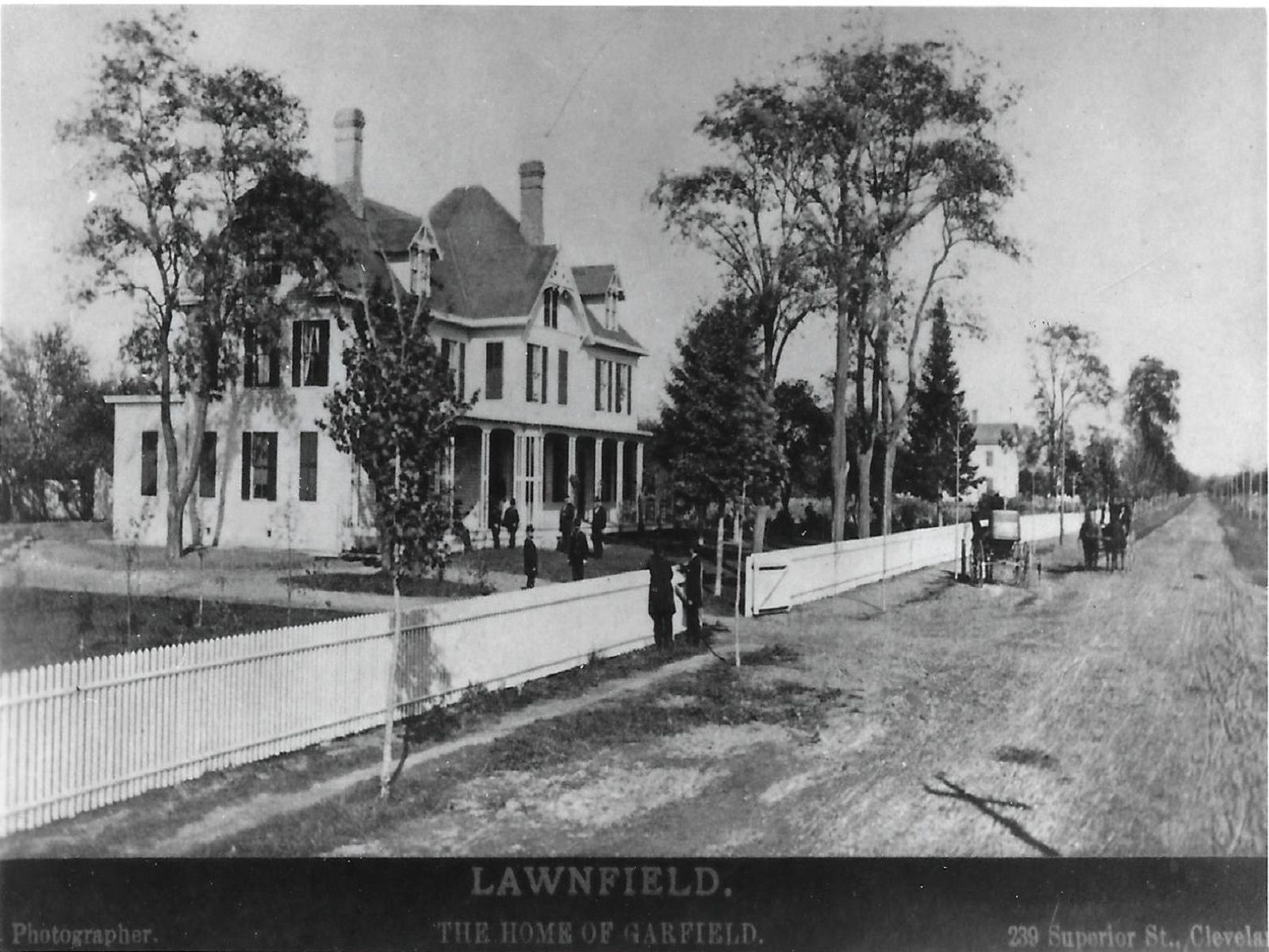 black and white photo of a farm house