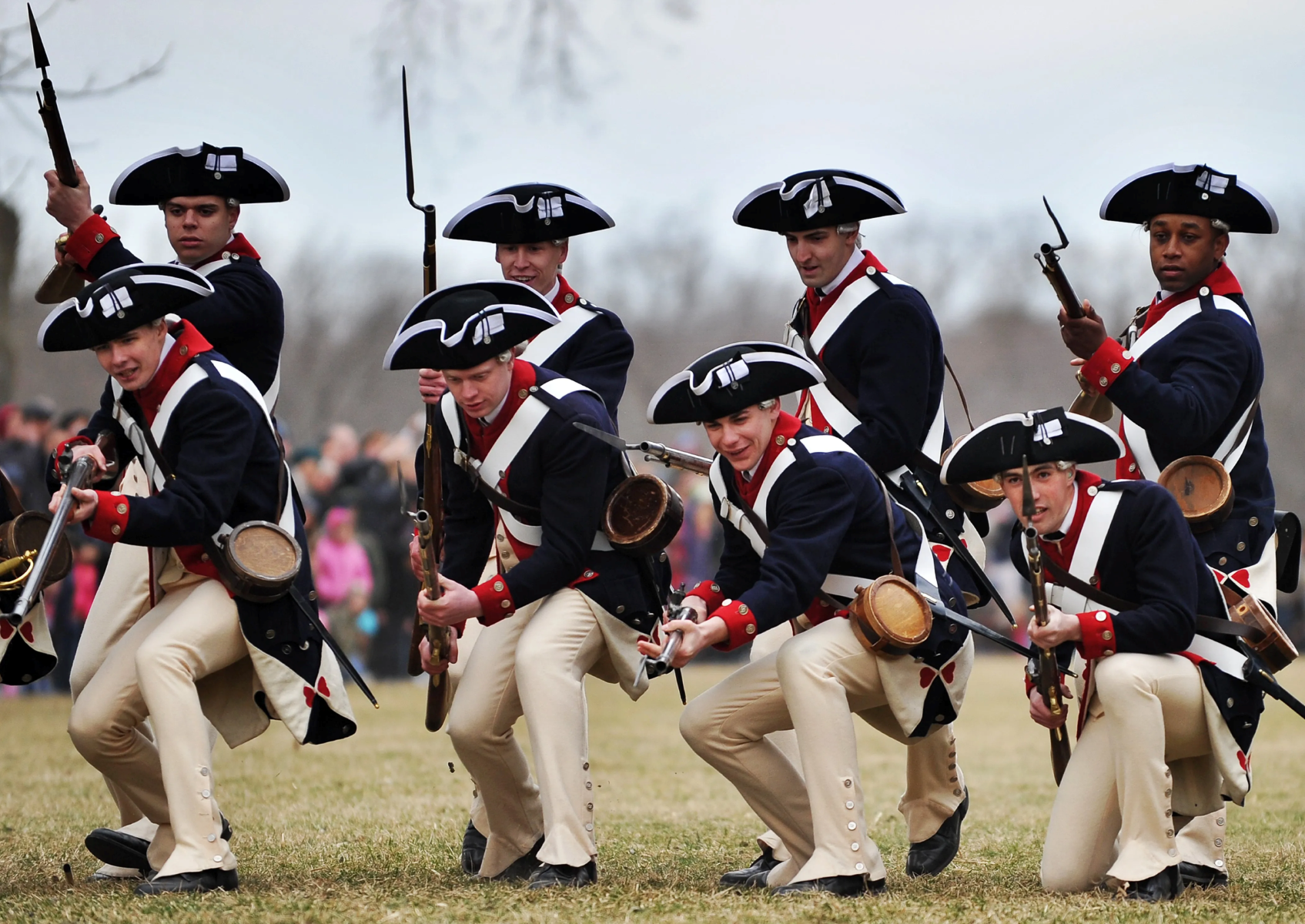 Eight men dressed as Continental Army soldiers