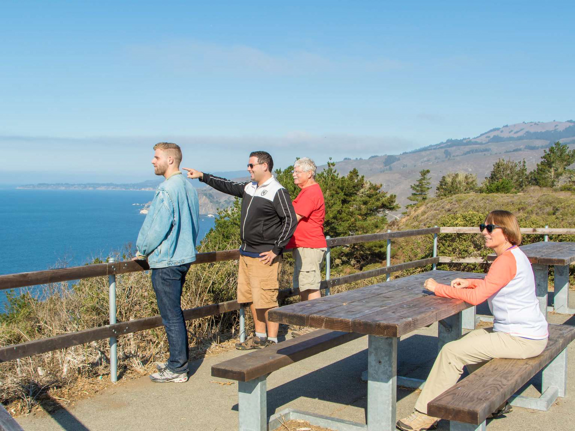 Colored photo of visitors enjoying the Muir Beach Overlook